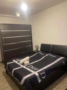 Voodi või voodid majutusasutuse La Home toas
