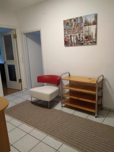 Uma área de estar em Apartment Fasching
