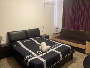 Voodi või voodid majutusasutuse La Home toas