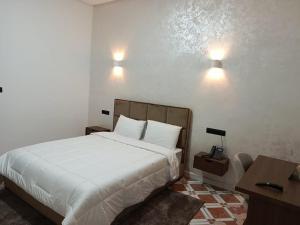 Postel nebo postele na pokoji v ubytování Hotel De Provence