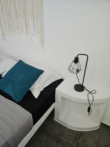 Postel nebo postele na pokoji v ubytování Eris Studios