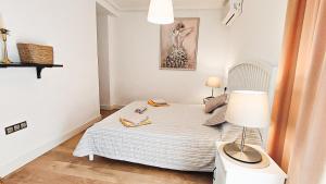 A bed or beds in a room at HABANERAS