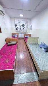 Postel nebo postele na pokoji v ubytování Time hostel