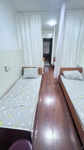 Postel nebo postele na pokoji v ubytování Time hostel