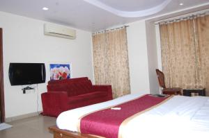 Televisor o centre d'entreteniment de Hotel satyam inn