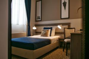 Łóżko lub łóżka w pokoju w obiekcie Hotel Jägerhorn
