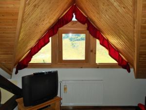 TV a/nebo společenská místnost v ubytování Apartments T&M