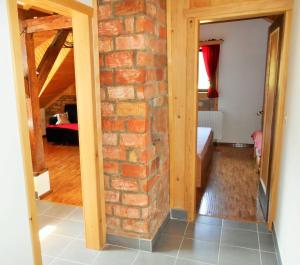 Postel nebo postele na pokoji v ubytování Apartments T&M