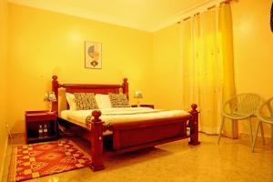 Postel nebo postele na pokoji v ubytování Palm Star Motel