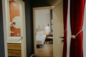 Postel nebo postele na pokoji v ubytování Luxury Inn Grand Residences