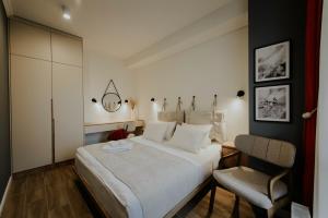 Postel nebo postele na pokoji v ubytování Luxury Inn Grand Residences