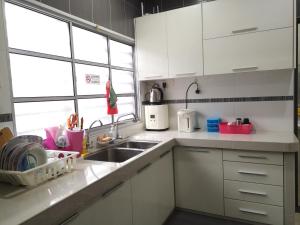 Cucina o angolo cottura di 优雅聚民宿