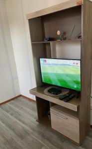 TV a/nebo společenská místnost v ubytování Oma + 4 fotografie