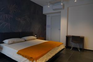 Postel nebo postele na pokoji v ubytování BLUMI Apartment