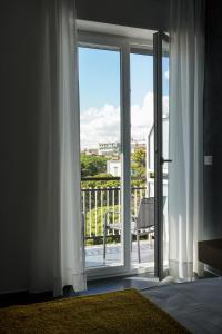 Balkón nebo terasa v ubytování BLUMI Apartment