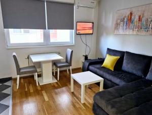 Ruang duduk di Apartman IDEA