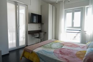 Postel nebo postele na pokoji v ubytování BLUMI Apartment