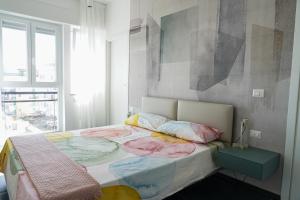 Postel nebo postele na pokoji v ubytování BLUMI Apartment
