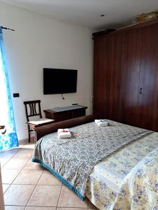 Ένα ή περισσότερα κρεβάτια σε δωμάτιο στο Casa Frida