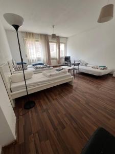 Ein Bett oder Betten in einem Zimmer der Unterkunft Big Apartments