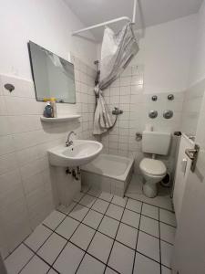 Ein Badezimmer in der Unterkunft Big Apartments