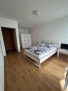 Ein Bett oder Betten in einem Zimmer der Unterkunft Big Apartments