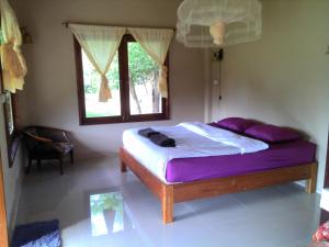 Katil atau katil-katil dalam bilik di Ing Doi Guest House