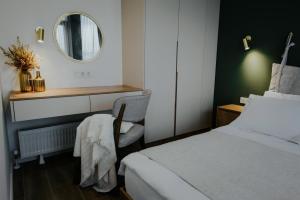 Postel nebo postele na pokoji v ubytování Luxury Inn Grand Residences