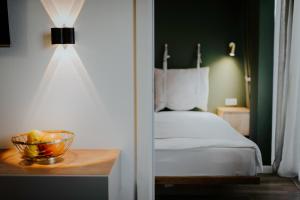 Postel nebo postele na pokoji v ubytování Luxury Inn Grand Residences