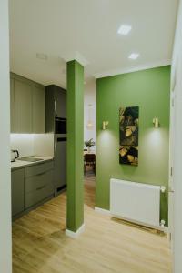Kuchyň nebo kuchyňský kout v ubytování Luxury Inn Grand Residences