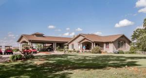 a large brick house with a large yard at Sweet Clover - Indoor pool - Hot Tub in Branson