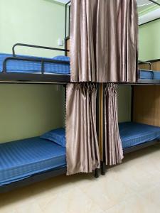 Ένα ή περισσότερα κρεβάτια σε δωμάτιο στο Liam's homestay +11 φωτογραφίες