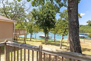 a view of the water from the deck of a house at Artilla Cove Cabin 4 - Lake views - Outdoor pool in Branson