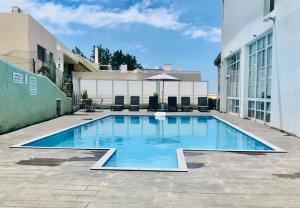 a swimming pool in the middle of a building at Monte Verde in Funchal