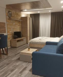 TV a/nebo společenská místnost v ubytování Apartman Viva Milmari