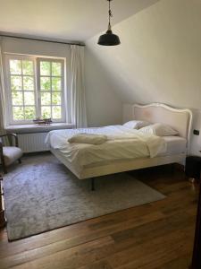 Postel nebo postele na pokoji v ubytování Imagine B&B