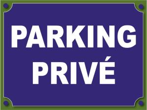 a purple parking sign with the words parking prime at The Originals Boutique Hotel Le Panorama Mont Dore in Le Mont-Dore