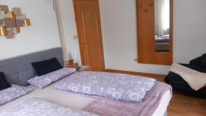 Postel nebo postele na pokoji v ubytování Residence Wiesenheim