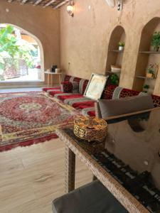 Area soggiorno di Al-Ghanima Rest House