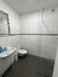 Koupelna v ubytování Penzion Kopanský mlýn
