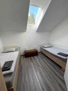 Postel nebo postele na pokoji v ubytování Penzion Kopanský mlýn + 18 fotografií