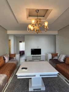 Posezení v ubytování Appartement de luxe avec une vue sur la mer