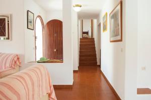 A bed or beds in a room at Villa Solana