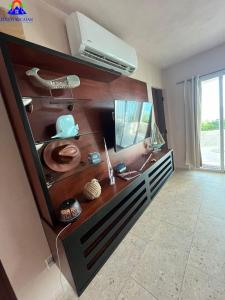 TV a/nebo společenská místnost v ubytování Deco Beach Villa 1 Beachfront