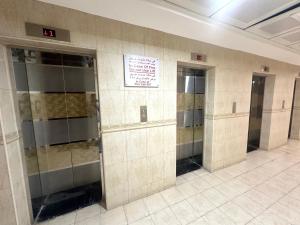 Foto Dubais asuva majutusasutuse Atelier Partition Room in Tecom Near Internet City Metro galeriist