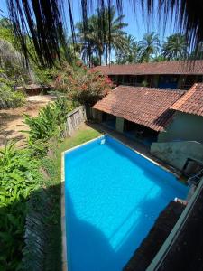 A piscina localizada em Eco Pousada Mentawai ou nos arredores
