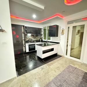 Kuchyň nebo kuchyňský kout v ubytování Home in sahline