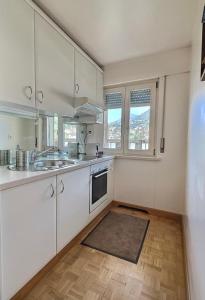 Kuhinja oz. manjša kuhinja v nastanitvi Appartement centre vue lac Léman