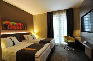 Postel nebo postele na pokoji v ubytování Holiday Inn Istanbul - Kadikoy by IHG