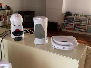 a counter with two appliances sitting on top of it at Sermar in Rabo de Peixe